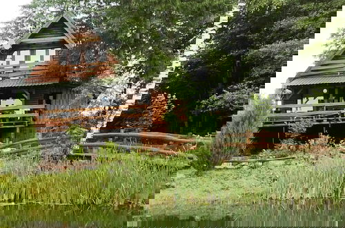 Photo 19 - Rustic Riverside Cabin in Forest