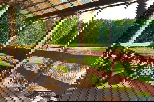 Photo 11 - Rustic Riverside Cabin in Forest