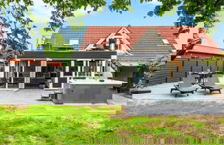 Foto 1 - 8 Person Holiday Home in Henne