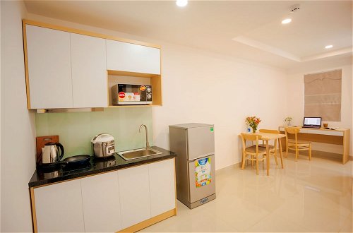Foto 1 - Meixing Apartment
