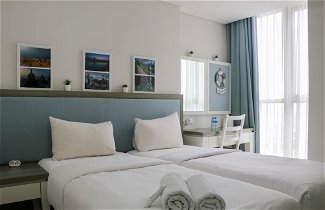 Photo 2 - Comfort and Elegant 1BR at Gold Coast Apartment