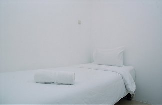 Photo 2 - Comfy and Furnished 2BR Bassura City Apartment near Mall