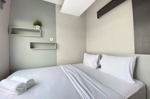 Photo 6 - Cozy Furnished 2Br Apartment At Grand Asia Afrika