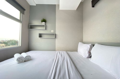 Photo 5 - Cozy Furnished 2Br Apartment At Grand Asia Afrika