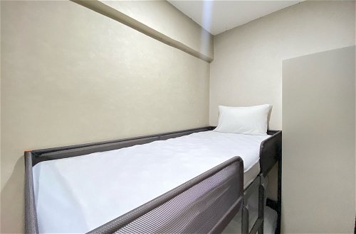 Photo 2 - Cozy Furnished 2Br Apartment At Grand Asia Afrika