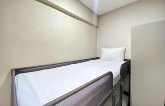 Photo 2 - Cozy Furnished 2Br Apartment At Grand Asia Afrika