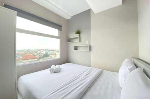 Photo 3 - Cozy Furnished 2Br Apartment At Grand Asia Afrika