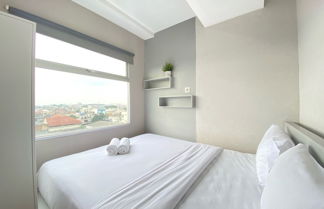 Foto 3 - Cozy Furnished 2Br Apartment At Grand Asia Afrika