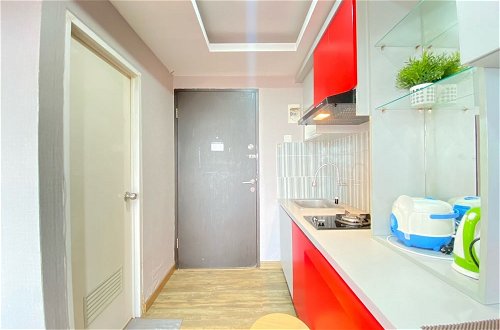 Photo 18 - Cozy Furnished 2Br Apartment At Grand Asia Afrika