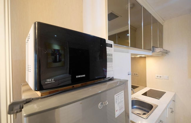 Modern and Comfortable 1BR at Casa Grande Apartment - Photo 13