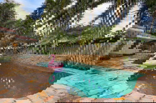 Foto 35 - Coral Ridge Getaway by Avantstay Pool Hot Tub Billiards 5mins to Beach
