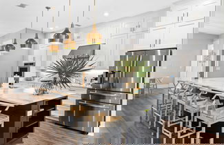 Foto 3 - Sea Dweller by Avantstay Rooftop Spa + Gulf View Golf Cart, Pool