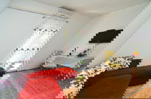 Foto 6 - Cozy Apartment With Shared Pool