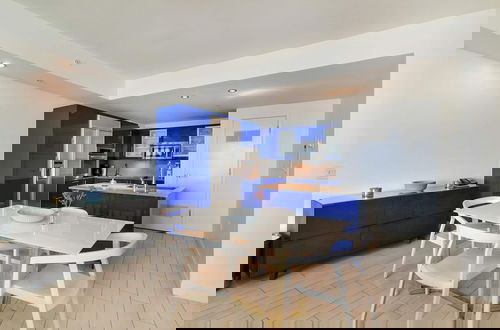 Foto 8 - 5-star Condo at The W Residences 1BR by Oneluxstay