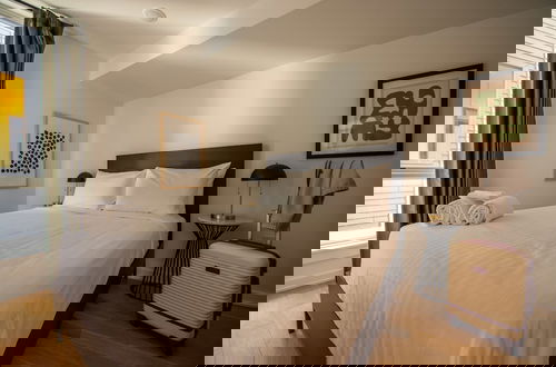 Photo 14 - Sosuite 2BR Apt w W D Newly Renovated
