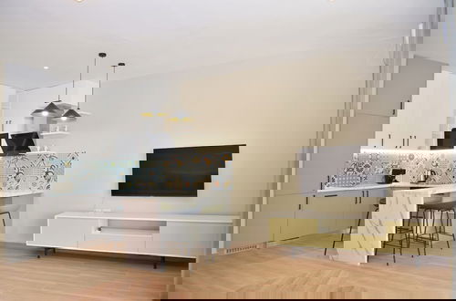Foto 5 - Pastel Apartment