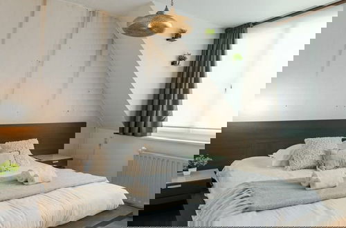 Foto 10 - Spacious Vacation Home for 12 Guests in Westende