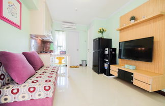 Photo 1 - Cozy 2BR Bassura City Apartment