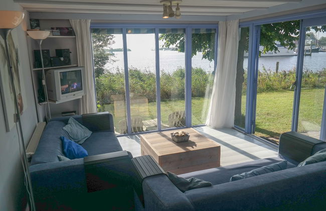 8 Pers Chalet Carla in Front of the Lauwersmeer and own Fishing Pier - Foto 9
