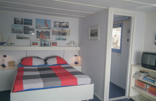 8 Pers Chalet Carla in Front of the Lauwersmeer and own Fishing Pier - Foto 4