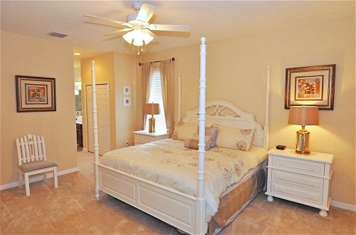 Photo 2 - Beautiful Pool/spa & Game Room Near Disney! 5 Bedroom Home by Redawning
