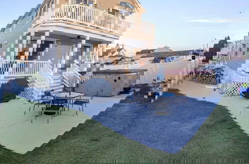 Foto 42 - Waves 'n Wooder by Avantstay Swimspa + Game Room, Walk to Beach