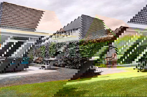 Foto 16 - House With Sauna, Outdoor spa and Pedal Boat