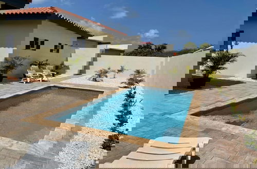 Foto 2 - Tranquil 2br2ba Close to the Beach Shared Pool