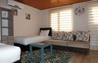 Photo 2 - Noi Suites