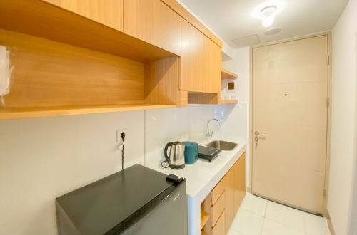 Photo 10 - Good Price And Homey Studio Tokyo Riverside Pik 2 Apartment