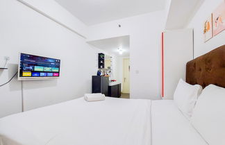 Photo 2 - Modern Studio Apartment M-Town Residence Near Shopping Mall