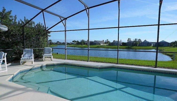 Foto 1 - 3 Bedroom Orlando Vacation Pool Home With Water View, Hot Tub, Games Room Near Disney