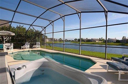 Photo 8 - 3 Bedroom Orlando Vacation Pool Home With Water View, Hot Tub, Games Room Near Disney