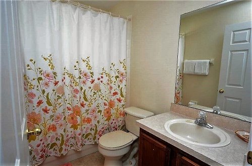 Photo 17 - 3 Bedroom Orlando Vacation Pool Home With Water View, Hot Tub, Games Room Near Disney
