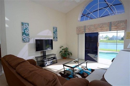Photo 13 - 3 Bedroom Orlando Vacation Pool Home With Water View, Hot Tub, Games Room Near Disney