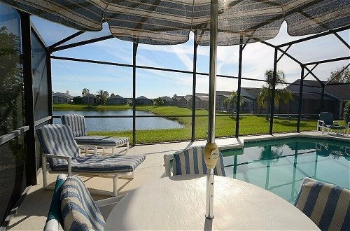 Photo 14 - 3 Bedroom Orlando Vacation Pool Home With Water View, Hot Tub, Games Room Near Disney