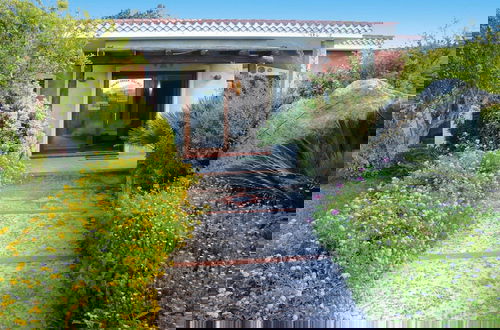 Foto 20 - Appartamento con 1 camera da letto a Palau con piscina e giardino