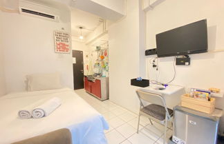 Photo 2 - Cozy Studio Room at Grand Asia Afrika Apartment