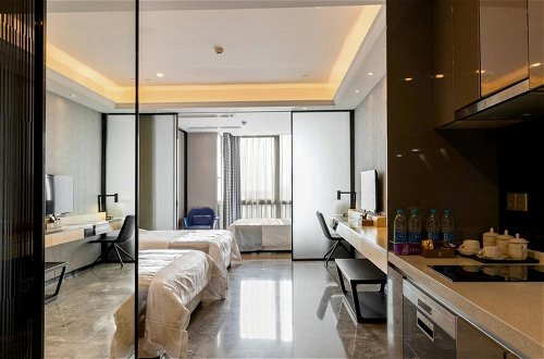 Photo 27 - Pengman International Apartment Hotel