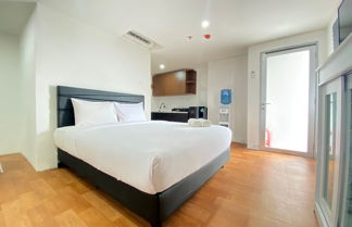 Photo 1 - Spacious Studio Room at Apartment Grand Asia Afrika Residence