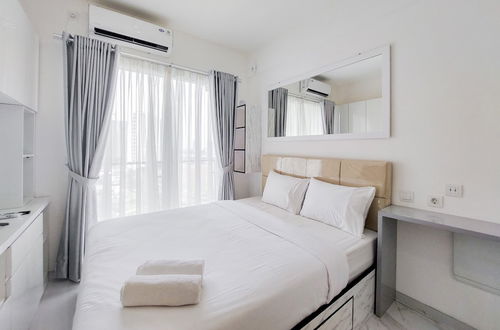 Photo 1 - Cozy Living and Comfort Studio at Sky House BSD Apartment