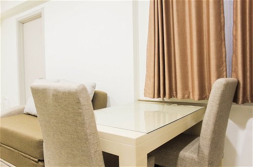 Photo 12 - Best And Homey 2Br With Sofa Bed At Meikarta Apartment