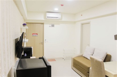 Photo 11 - Best And Homey 2Br With Sofa Bed At Meikarta Apartment