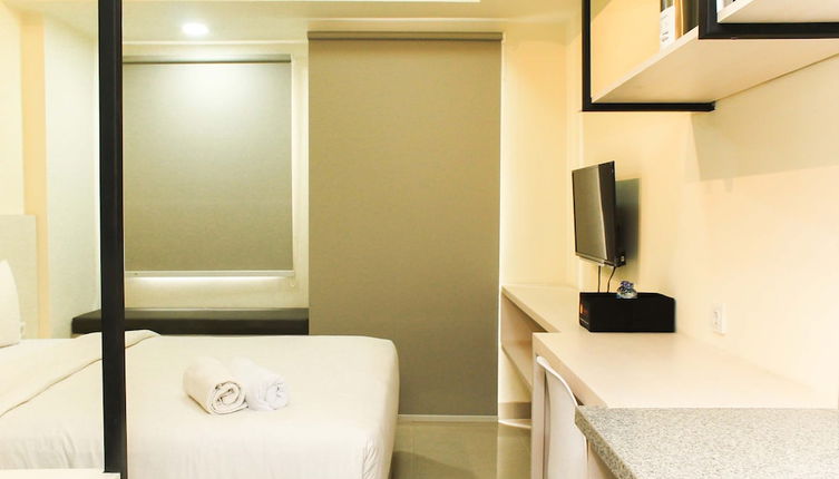 Photo 1 - Nice And Comfort Studio Apartment At Mustika Golf Residence