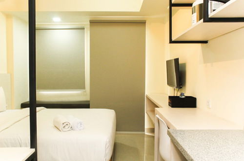 Photo 1 - Nice And Comfort Studio Apartment At Mustika Golf Residence