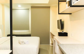 Photo 1 - Nice And Comfort Studio Apartment At Mustika Golf Residence