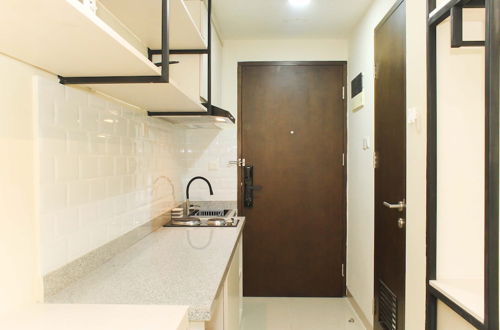 Photo 7 - Nice And Comfort Studio Apartment At Mustika Golf Residence