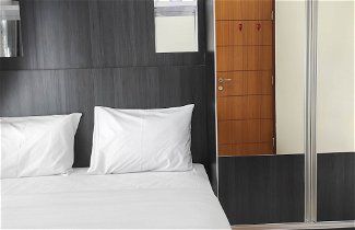 Photo 3 - Comfort 2Br Apartment At Vida View Makassar