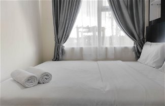 Photo 2 - Comfort 2Br Apartment At Vida View Makassar