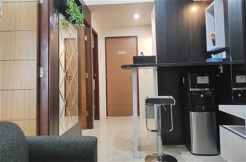 Photo 9 - Comfort 2Br Apartment At Vida View Makassar